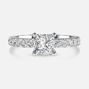 a diamond ring with a square stone