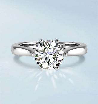 a diamond ring with a diamond in the center